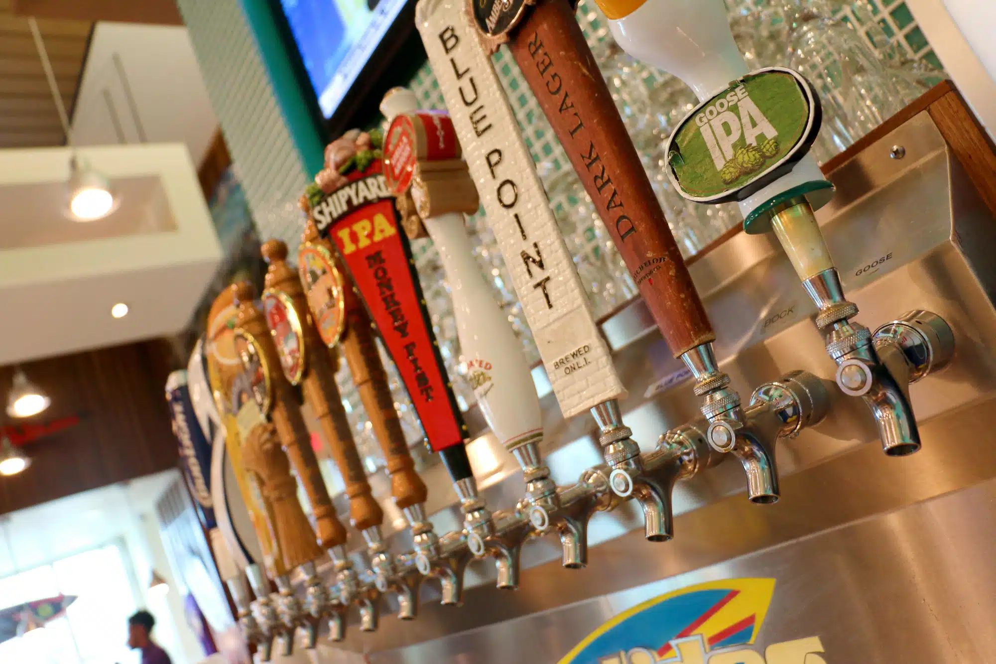Row of beer taps at a restaurant in Pensacola Beach, Florida.