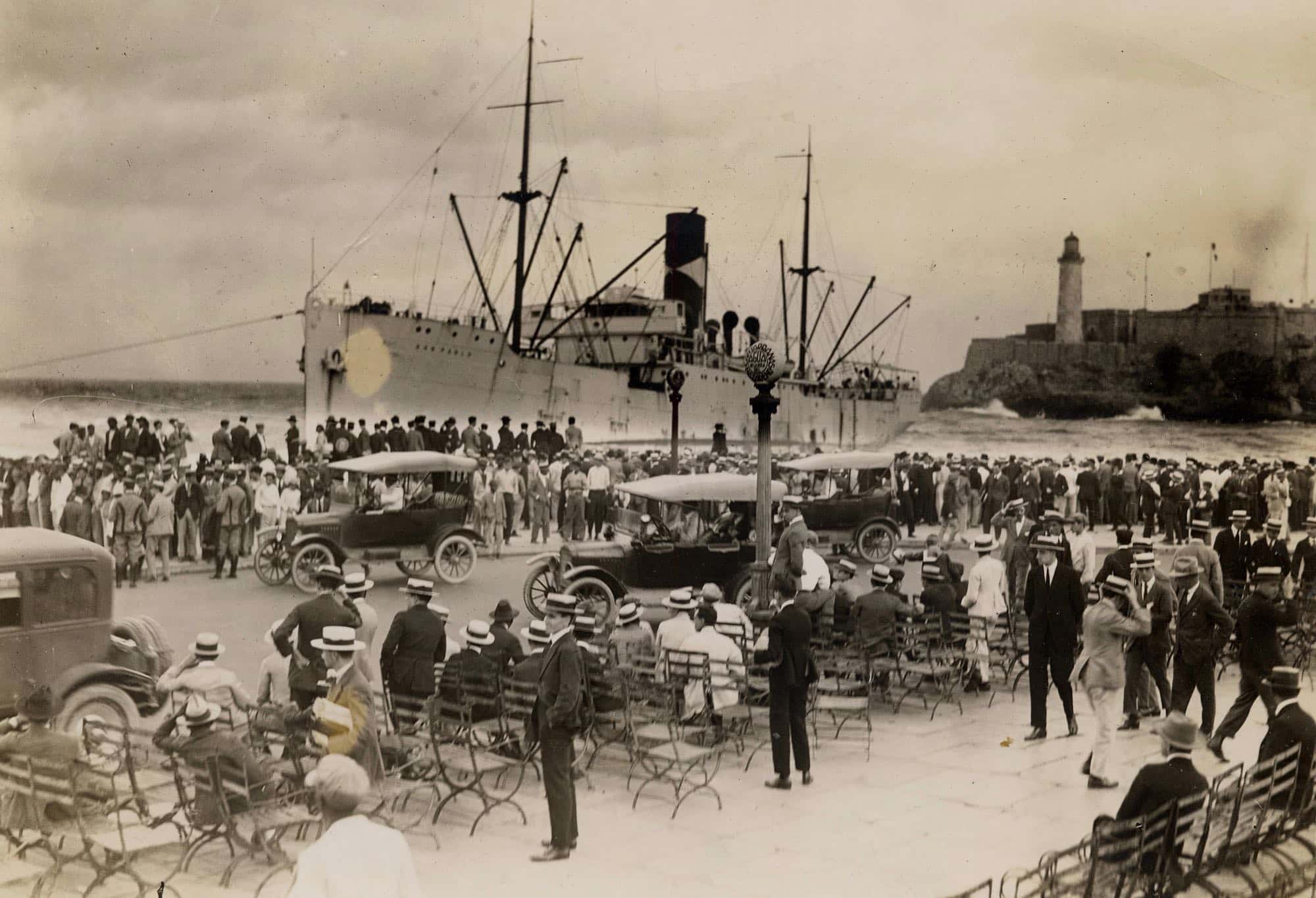 San Pablo fruit import ship being watched by a crowd of people sometime during the early 1900s.